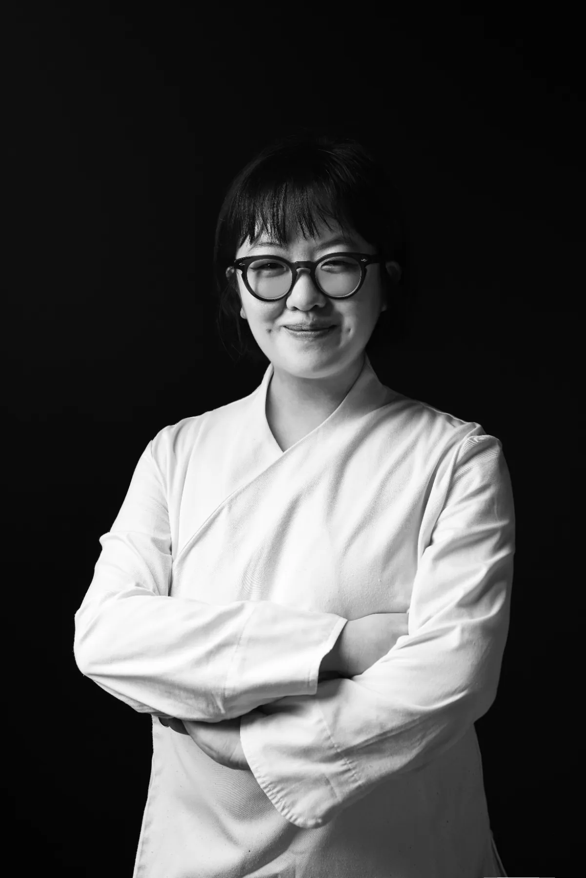 Black-and-white portrait of Executive Chef Yoonhaeng Heo (Hailey)